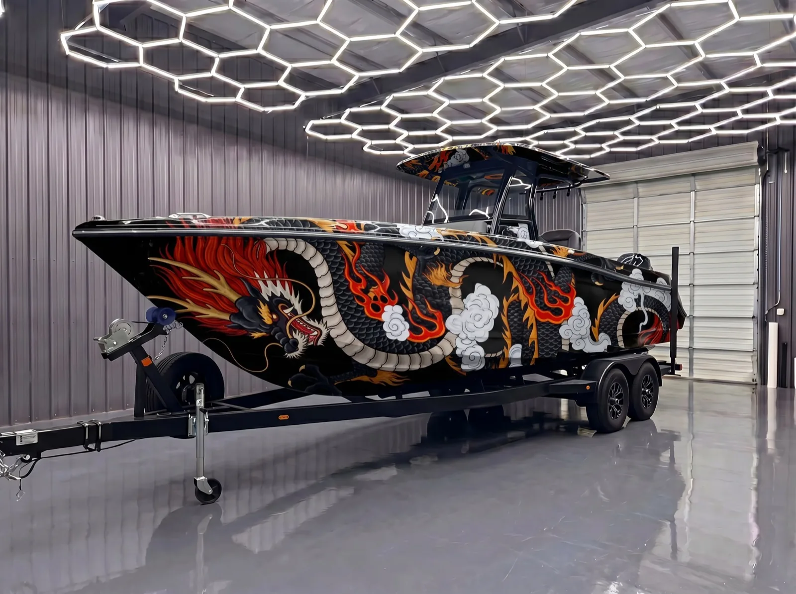 Sport boat with a hyper custom vinyl wrap on a trailer in the KK Car Wrap studio